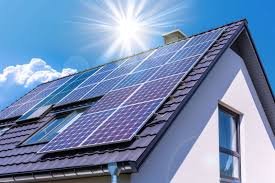 A portable power station being charged by a solar panel outdoors, illustrating off-grid capabilities